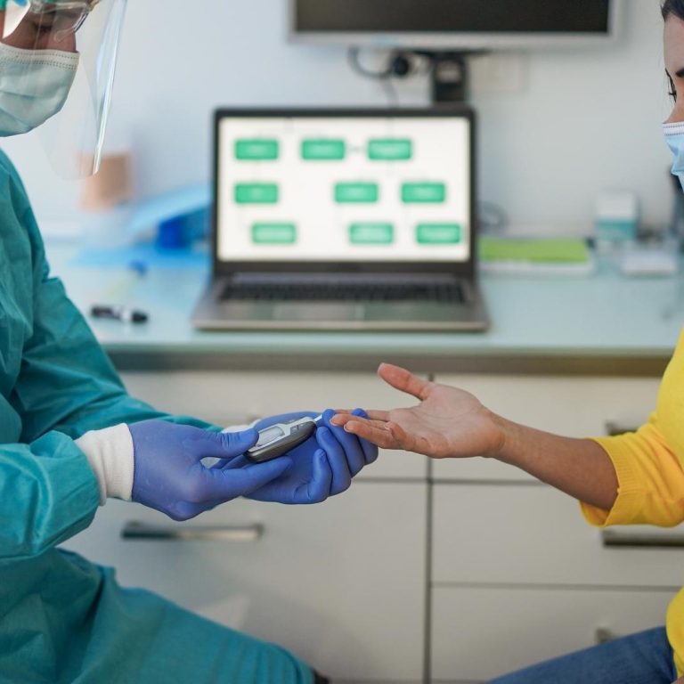 doctor-making-blood-sugar-test-to-a-young-woman-in-2021-09-03-02-28-22-utc_c doctor-making-blood-sugar-test-to-a-young-woman-in-2021-09-03-02-28-22-utc_c